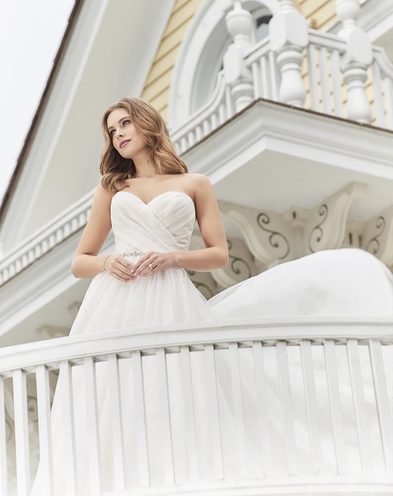 Blonde bride in Christina Wu dress