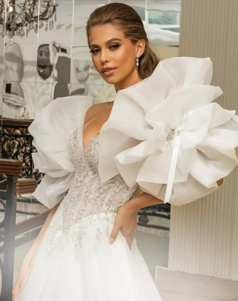 Brunette bride in Kitty Chen dress